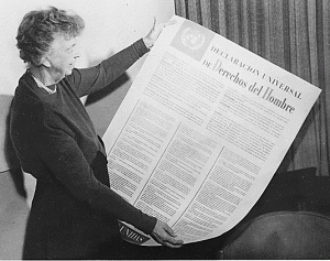 Eleanor Roosevelt with a Spanish Language version of the UNDHR, 1949