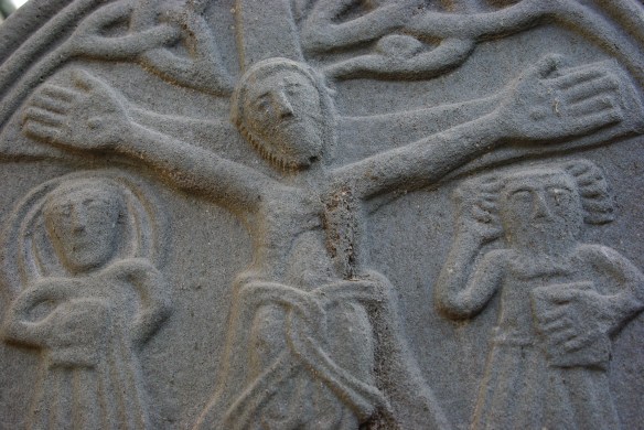Carved stone cross, crucifixion, detail