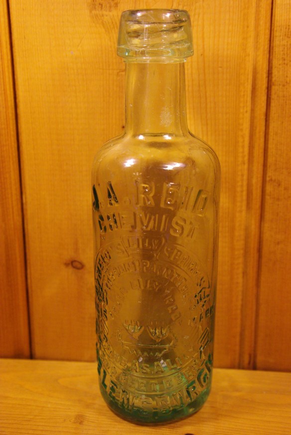 JA Reid bottle